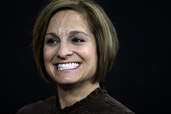 A closeup of Mary Lou Retton, smiling.