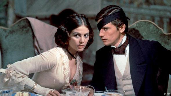 Cardinale and Delon (left) in a scene from "Il Gattopardo" by Luchino Visconti.